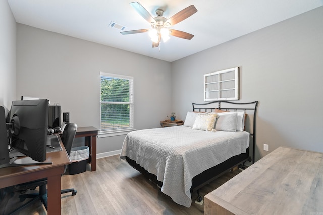 26 Edward Way, Greenbrier, AR 72058 - bedroom with wood finished floors, a desk, and ceiling fan