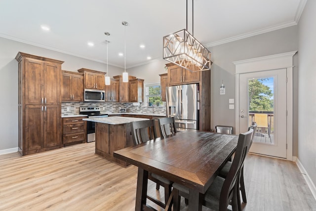 26 Edward Way, Greenbrier, AR 72058 - dining space with light wood-type flooring, ornamental molding, and recessed lighting