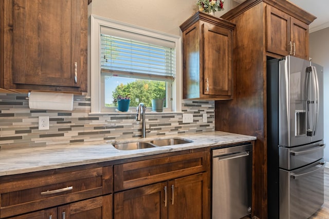 26 Edward Way, Greenbrier, AR 72058 - kitchen featuring appliances with stainless steel finishes, decorative backsplash, and light stone countertops