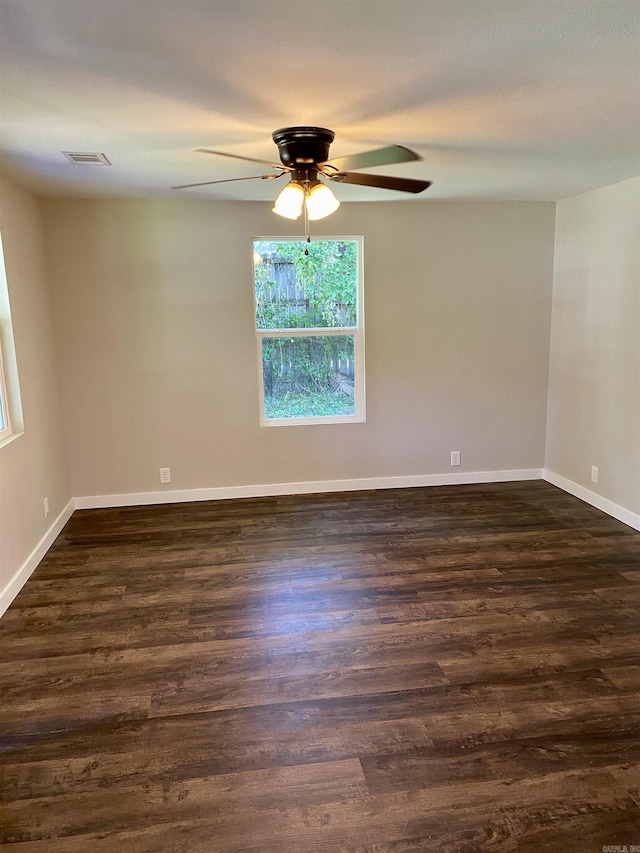 103 S 7th, Coal Hill, AR 72832 - unfurnished room featuring a ceiling fan and dark wood-style floors
