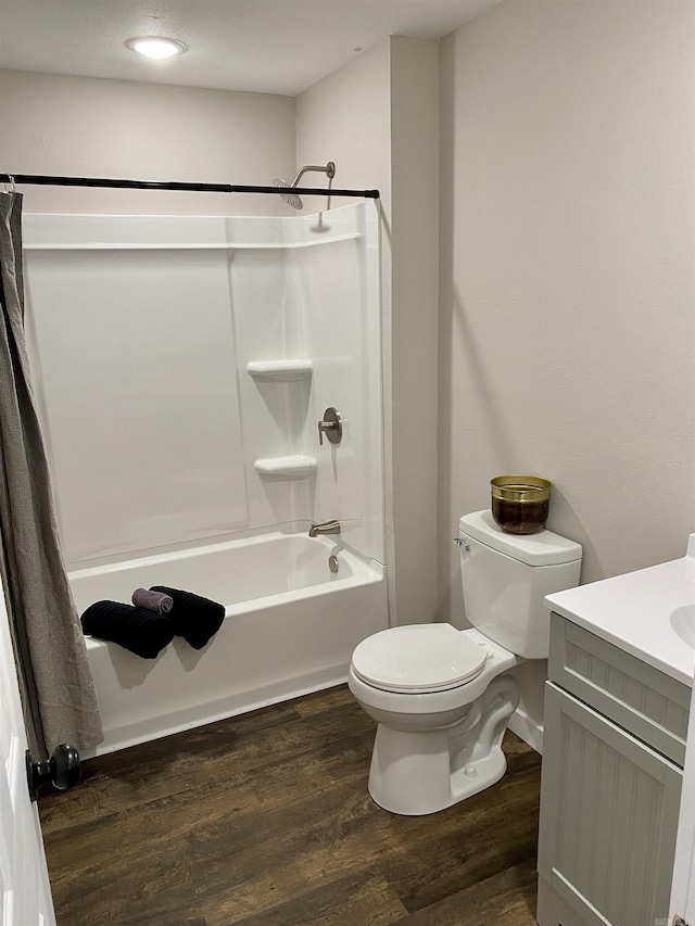 103 S 7th, Coal Hill, AR 72832 - full bathroom featuring shower / bath combo with shower curtain, vanity, and wood finished floors