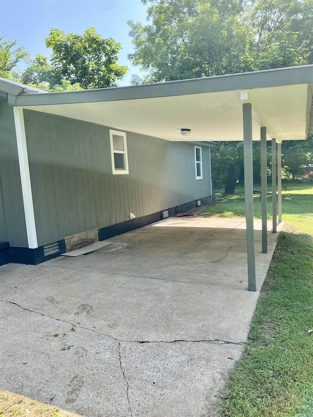 103 S 7th, Coal Hill, AR 72832 - view of parking / parking lot featuring a carport and driveway