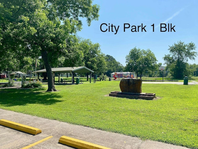 103 S 7th, Coal Hill, AR 72832 - view of property's community featuring a gazebo, a lawn, and uncovered parking
