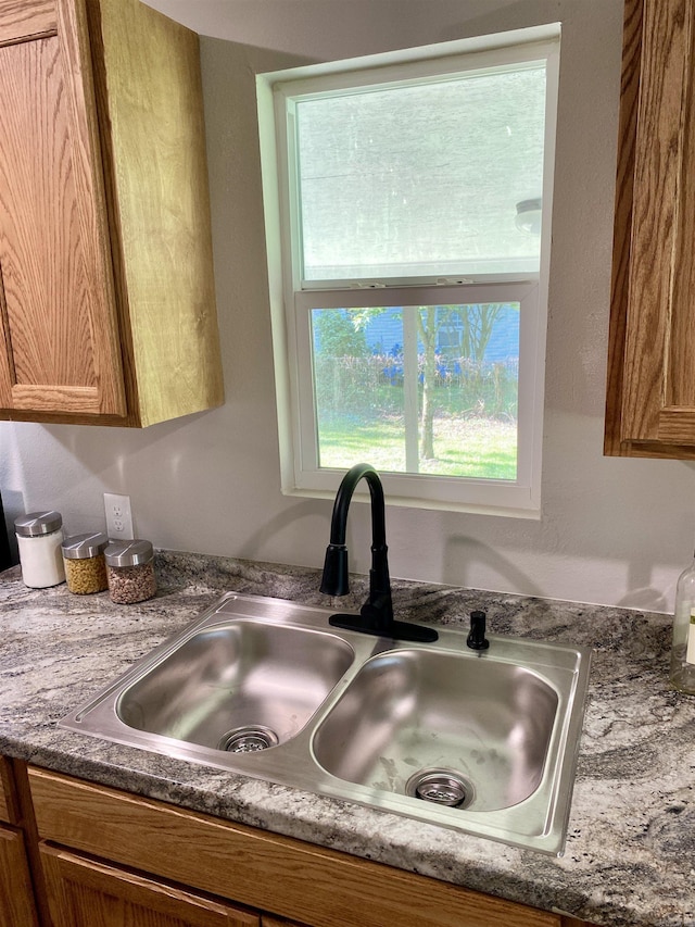 103 S 7th, Coal Hill, AR 72832 - kitchen with a sink and brown cabinetry