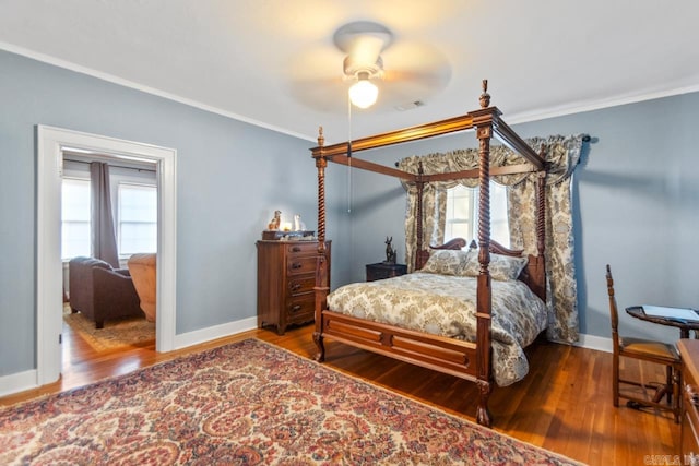 301 W Magnolia St, Rison, AR 71665 - bedroom featuring ornamental molding and wood finished floors