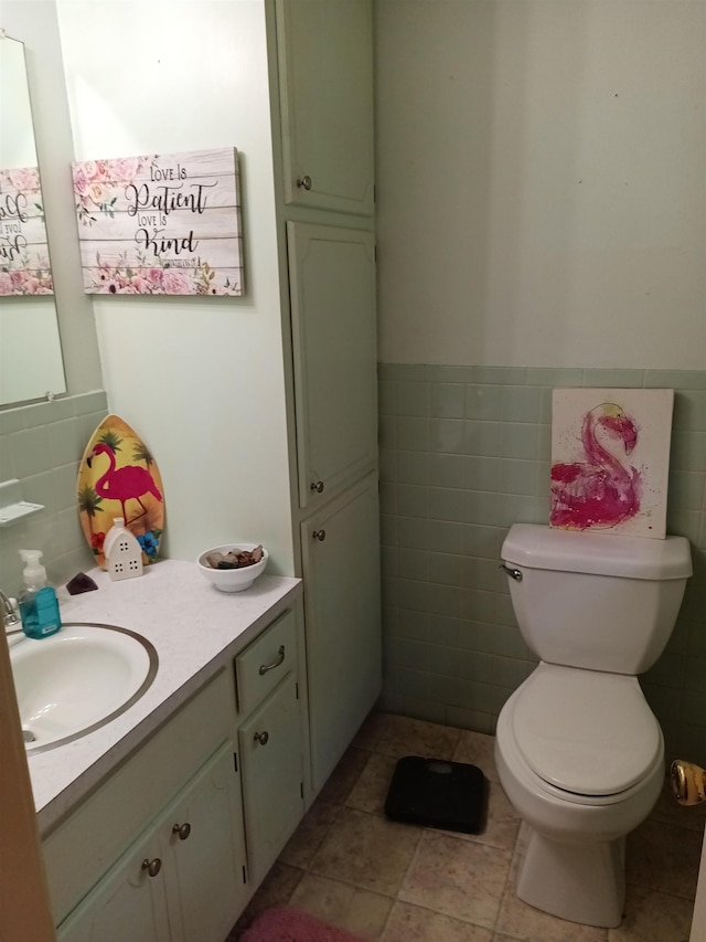 203 Diamond Ln, Horseshoe Bend, AR 72512 - half bathroom with tile walls, vanity, and a wainscoted wall