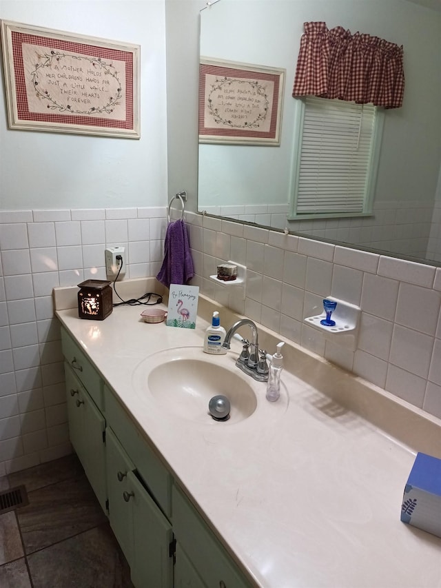 203 Diamond Ln, Horseshoe Bend, AR 72512 - bathroom with vanity and tile walls