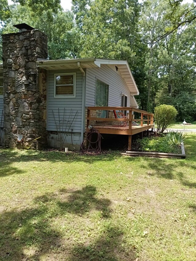 203 Diamond Ln, Horseshoe Bend, AR 72512 - rear view of house with a deck, a lawn, and crawl space