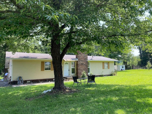 4 Trout, Heber Springs, AR 72543 - back of house featuring a yard