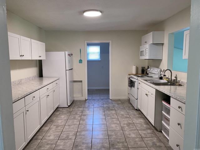 4 Trout, Heber Springs, AR 72543 - kitchen featuring white appliances, white cabinetry, and light tile patterned floors