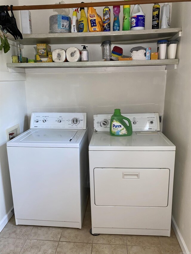 4 Trout, Heber Springs, AR 72543 - laundry room featuring washing machine and dryer and light tile patterned floors
