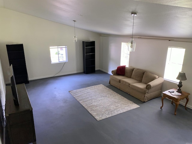4 Trout, Heber Springs, AR 72543 - living area featuring concrete floors and vaulted ceiling