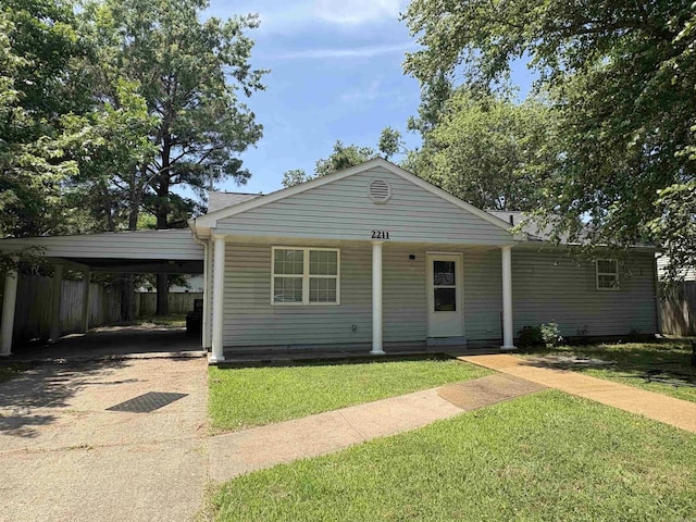 2211 Sutton Dr, Jonesboro, AR 72401 - bungalow featuring driveway and a carport