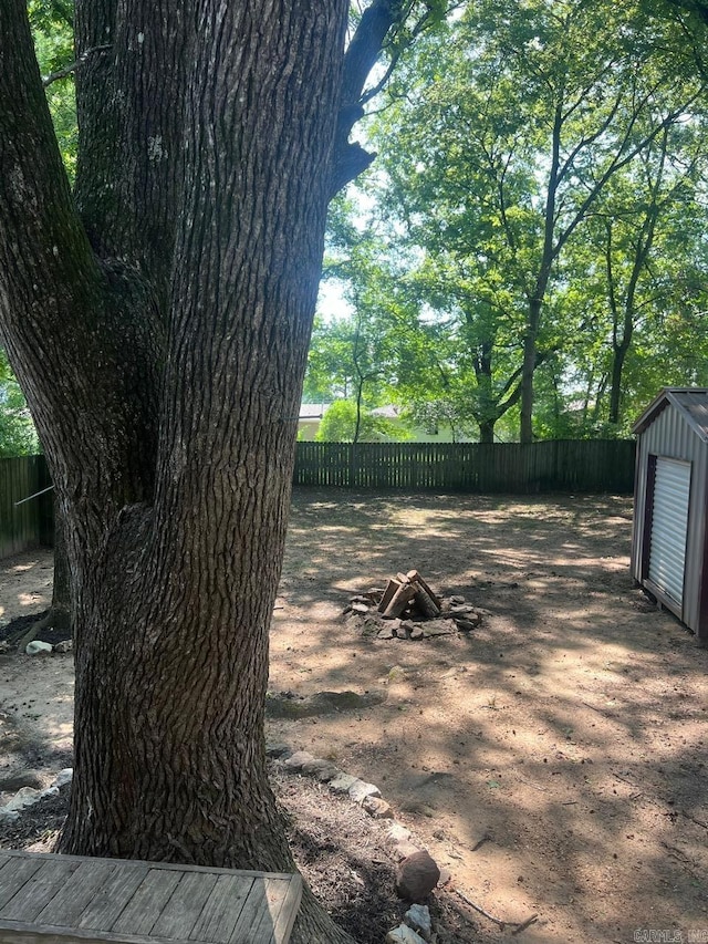 809 Banner St, Benton, AR 72015 - deck with a fenced backyard and a shed