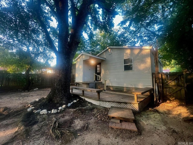 809 Banner St, Benton, AR 72015 - rear view of property featuring a fenced backyard and a deck
