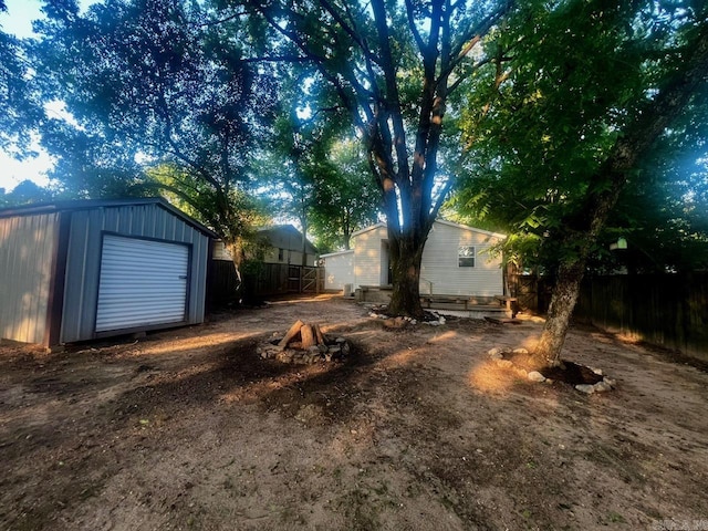 809 Banner St, Benton, AR 72015 - view of yard featuring a storage shed