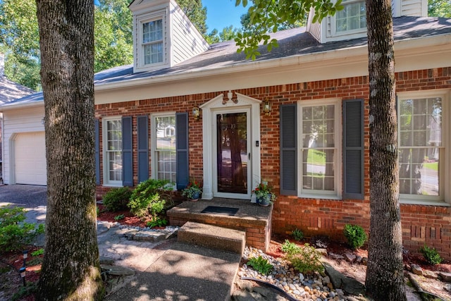 10 Cedar Branch Dr, Little Rock, AR 72223 - property entrance featuring brick siding and a garage