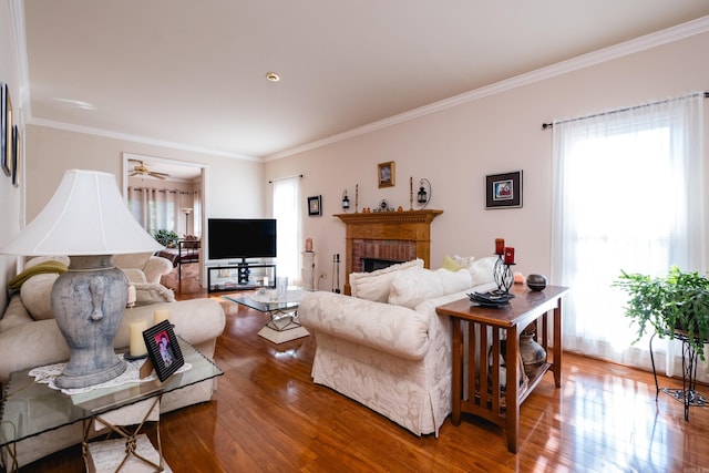 10 Cedar Branch Dr, Little Rock, AR 72223 - living room with wood-type flooring, ornamental molding, a fireplace, and a ceiling fan