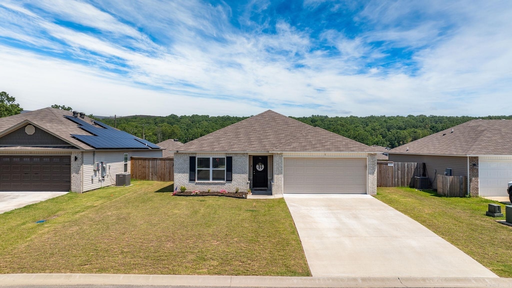 3 Sun Drenched Trl, Conway, AR 72032 - ranch-style house with brick siding, a shingled roof, driveway, and a garage
