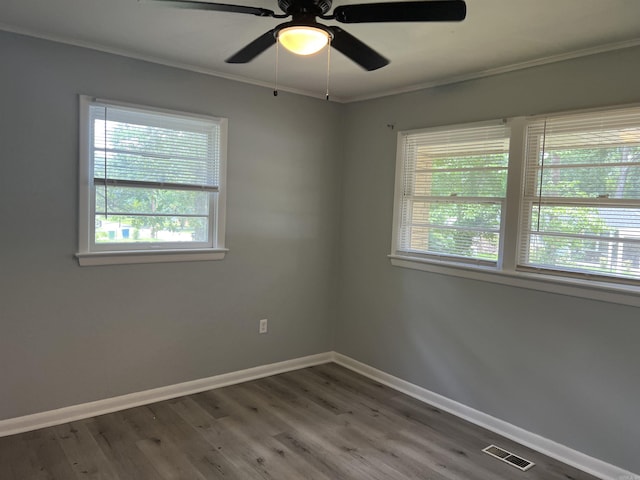 8713 Westwood Ave, Little Rock, AR 72204 - unfurnished room with crown molding, ceiling fan, and wood finished floors