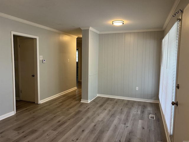8713 Westwood Ave, Little Rock, AR 72204 - unfurnished room with ornamental molding and wood finished floors