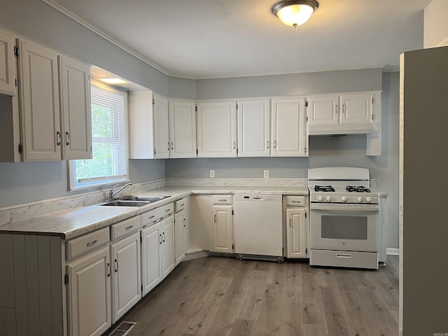 8713 Westwood Ave, Little Rock, AR 72204 - kitchen featuring white appliances, white cabinetry, light countertops, and ornamental molding