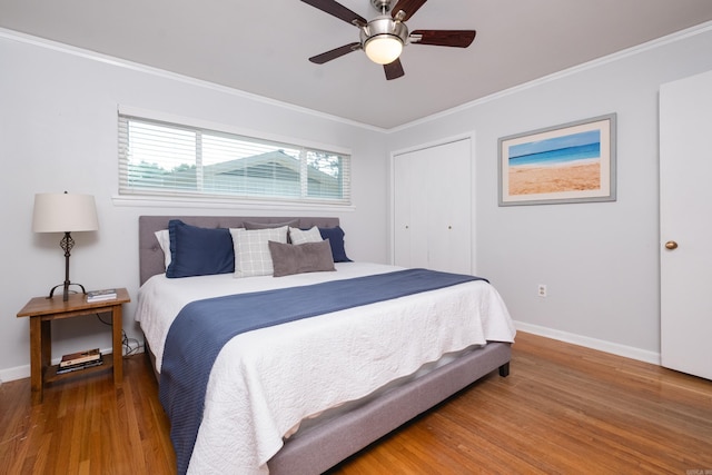 4509 Crestline Dr, North Little Rock, AR 72116 - bedroom with wood finished floors, crown molding, and a ceiling fan
