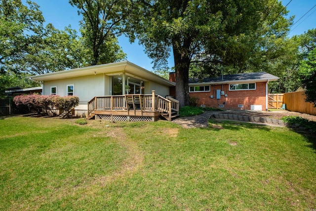 4509 Crestline Dr, North Little Rock, AR 72116 - rear view of house featuring a deck and a fenced backyard