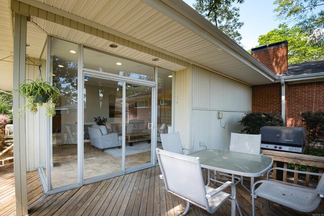 4509 Crestline Dr, North Little Rock, AR 72116 - deck featuring area for grilling and outdoor dining area