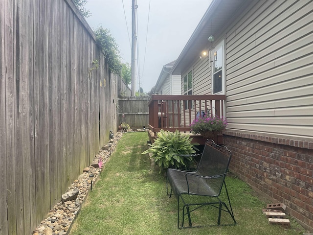 view of yard with a deck