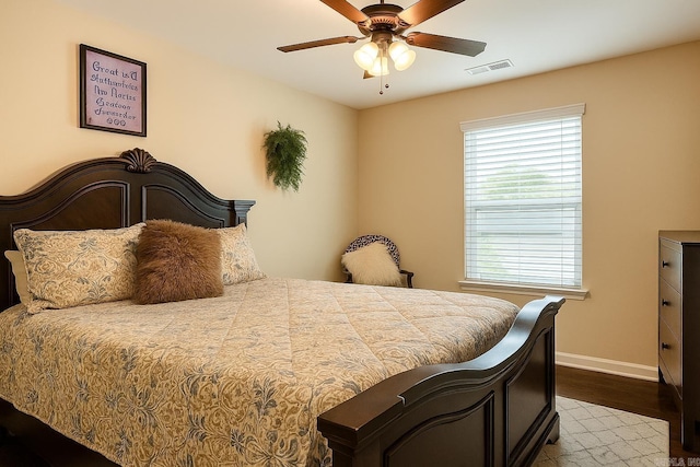 bedroom with wood finished floors and ceiling fan