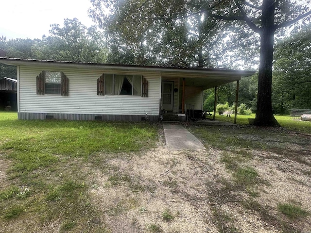 90 Red Oak Rd, Rison, AR 71665 - manufactured / mobile home featuring an attached carport, driveway, crawl space, and entry steps