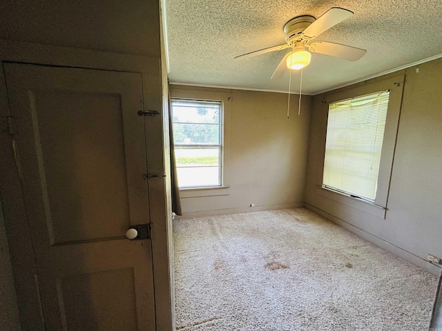 110 Saint Vincent St, Morrilton, AR 72110 - carpeted spare room featuring a textured ceiling and ceiling fan