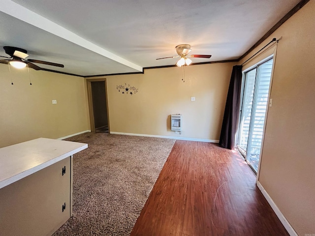 110 Saint Vincent St, Morrilton, AR 72110 - empty room featuring ceiling fan, heating unit, and wood finished floors