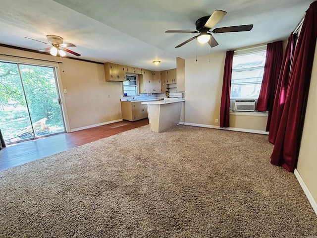 110 Saint Vincent St, Morrilton, AR 72110 - kitchen with a ceiling fan, open floor plan, light countertops, and carpet flooring