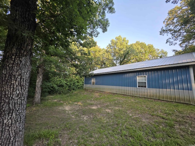 220 Hopewell Hollow Rd, Norfork, AR 72658 - view of property exterior with a metal roof and a lawn