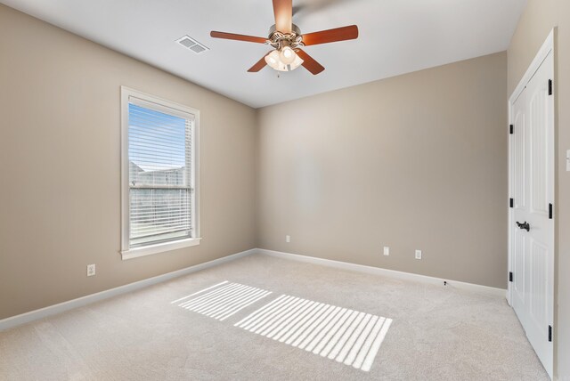205 Lucia Ln, North Little Rock, AR 72113 - spare room featuring light carpet and ceiling fan
