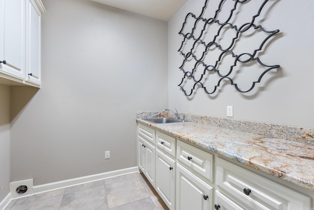 205 Lucia Ln, North Little Rock, AR 72113 - washroom featuring cabinet space and light tile patterned floors