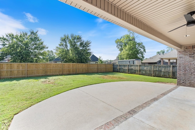 205 Lucia Ln, North Little Rock, AR 72113 - fenced backyard with a patio and a ceiling fan