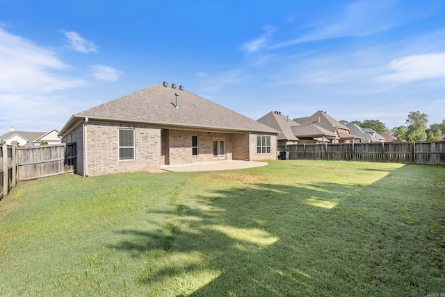 205 Lucia Ln, North Little Rock, AR 72113 - rear view of property featuring brick siding, a fenced backyard, a patio, and roof with shingles