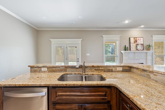 205 Lucia Ln, North Little Rock, AR 72113 - kitchen featuring stainless steel dishwasher, light stone countertops, crown molding, a fireplace, and recessed lighting