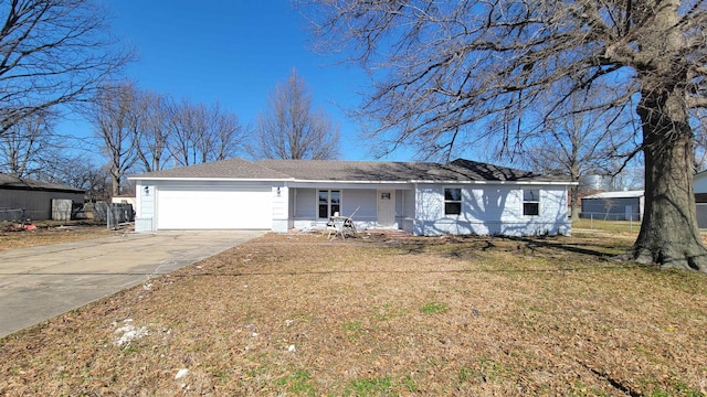 705 Liberty, Marked Tree, AR 72365 - ranch-style house featuring a garage, concrete driveway, and covered porch