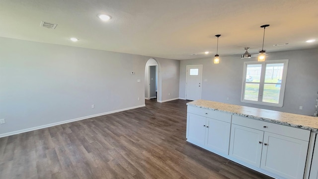 705 Liberty, Marked Tree, AR 72365 - kitchen with arched walkways, recessed lighting, dark wood finished floors, a ceiling fan, and hanging light fixtures
