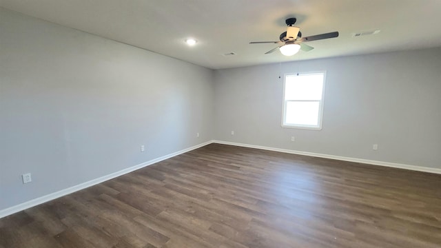 705 Liberty, Marked Tree, AR 72365 - empty room with ceiling fan, dark wood-type flooring, and recessed lighting