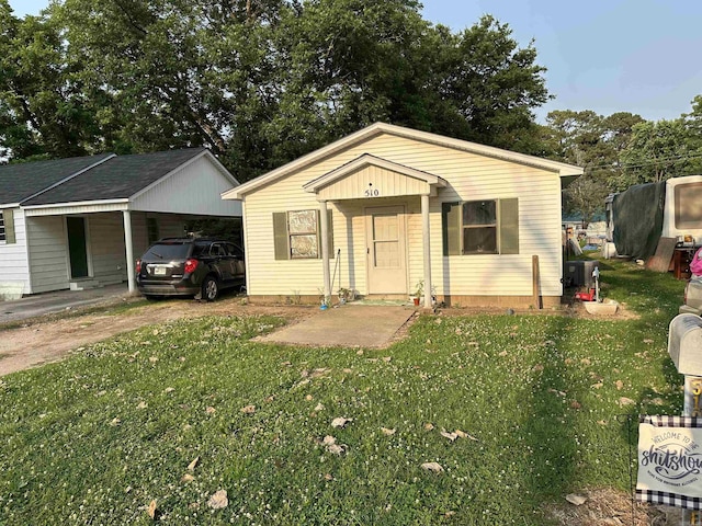 510 Kenmore St, Corning, AR 72422 - view of front of house with a front yard