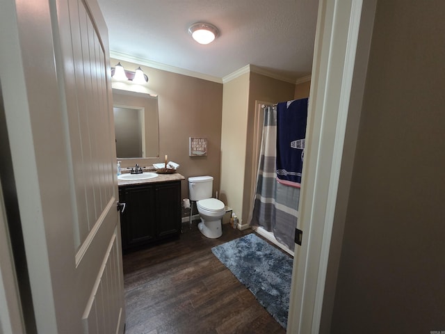 274 Hopewell Hollow Rd, Norfork, AR 72658 - full bath featuring ornamental molding, wood finished floors, vanity, a textured ceiling, and a shower with curtain