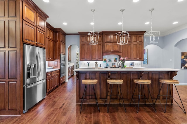 203 Miramar Blvd, Little Rock, AR 72223 - kitchen with arched walkways, appliances with stainless steel finishes, ornamental molding, light countertops, and tasteful backsplash