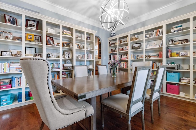 203 Miramar Blvd, Little Rock, AR 72223 - dining room featuring a chandelier, ornamental molding, wood finished floors, and arched walkways