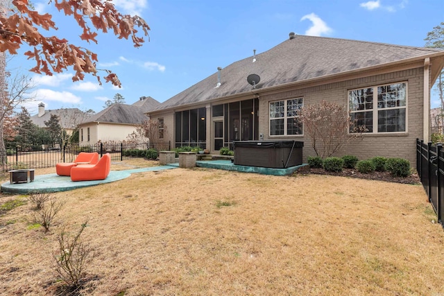 203 Miramar Blvd, Little Rock, AR 72223 - back of property featuring a hot tub, a fenced backyard, a patio, a sunroom, and brick siding