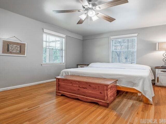 22 Nob Hill Cv, Little Rock, AR 72205 - bedroom with light wood-type flooring and a ceiling fan